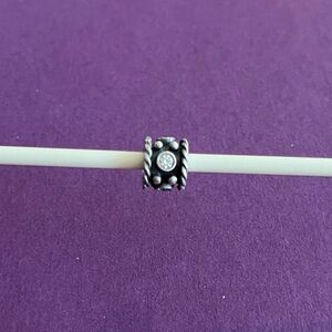 Pandora Sterling Silver Oxy Crown charm with clear CZ stones.